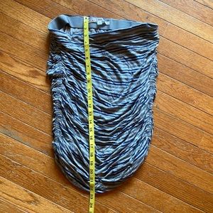 Form fitting stretch comfy skirt that is stylish to wear dress up or down.